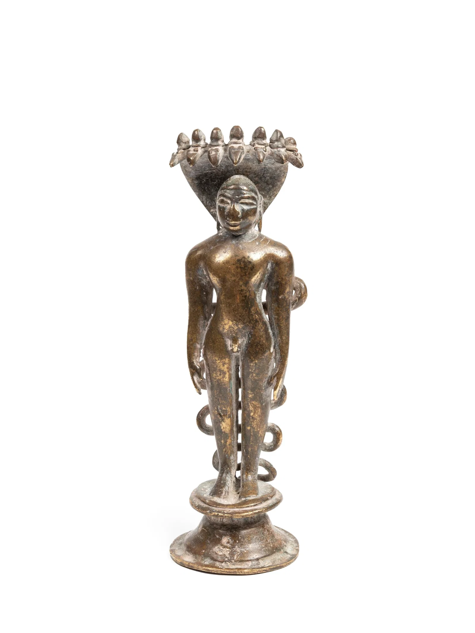 A BRASS SCULPTURE OF JINA PARSVANATHA, India, 16th century