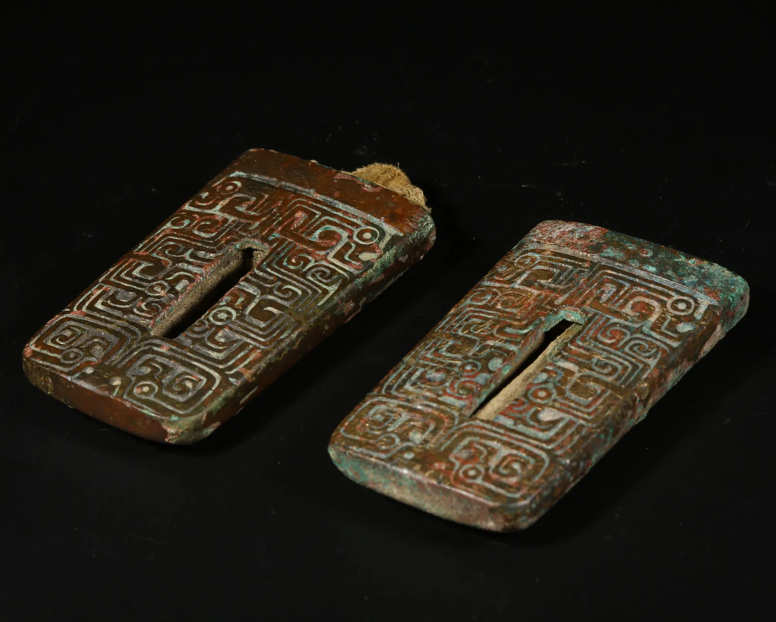 A BRONZE BEAST-FACE SWORD GUARD SET