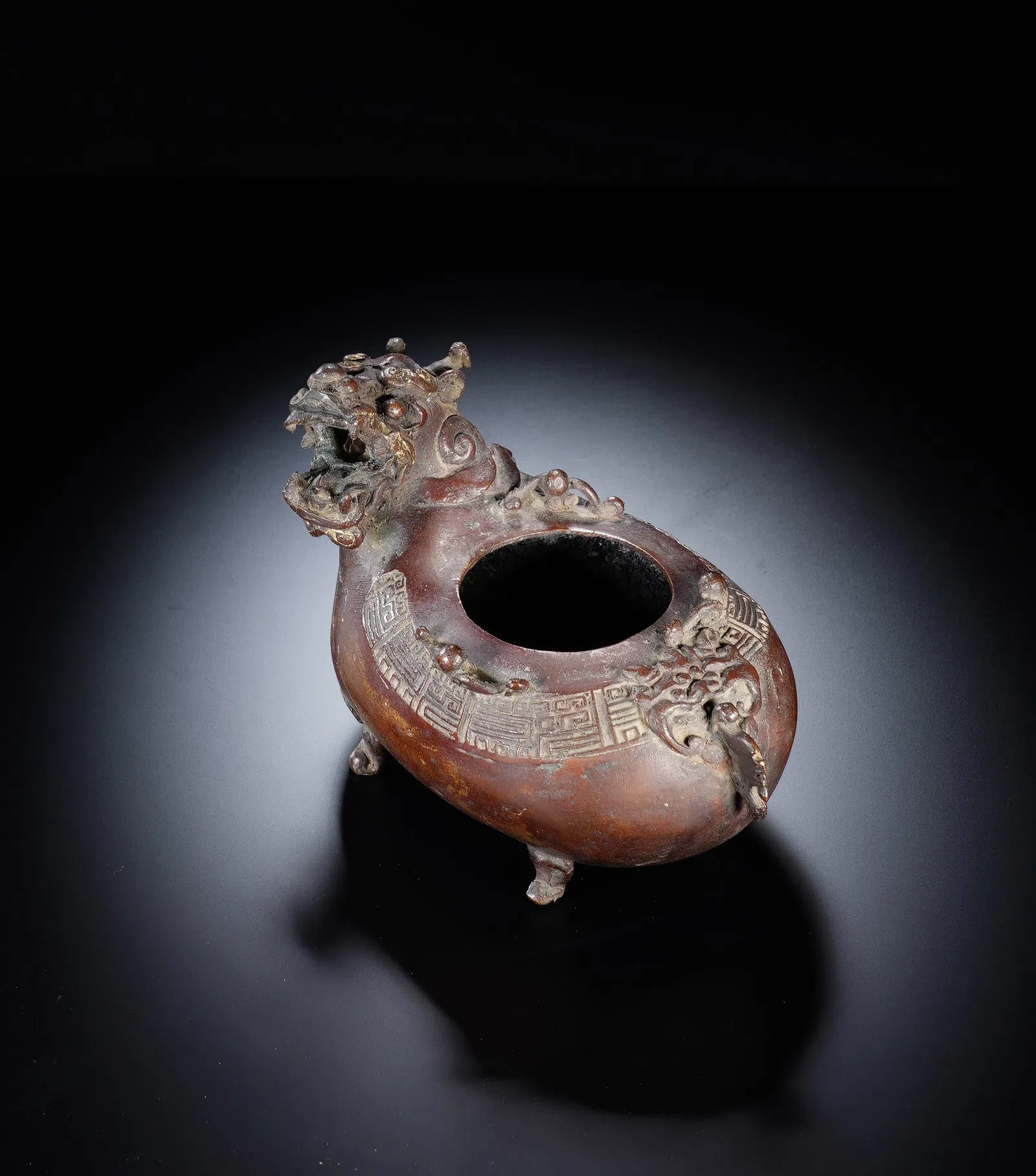 A BRONZE BEAST INCENSE BURNER