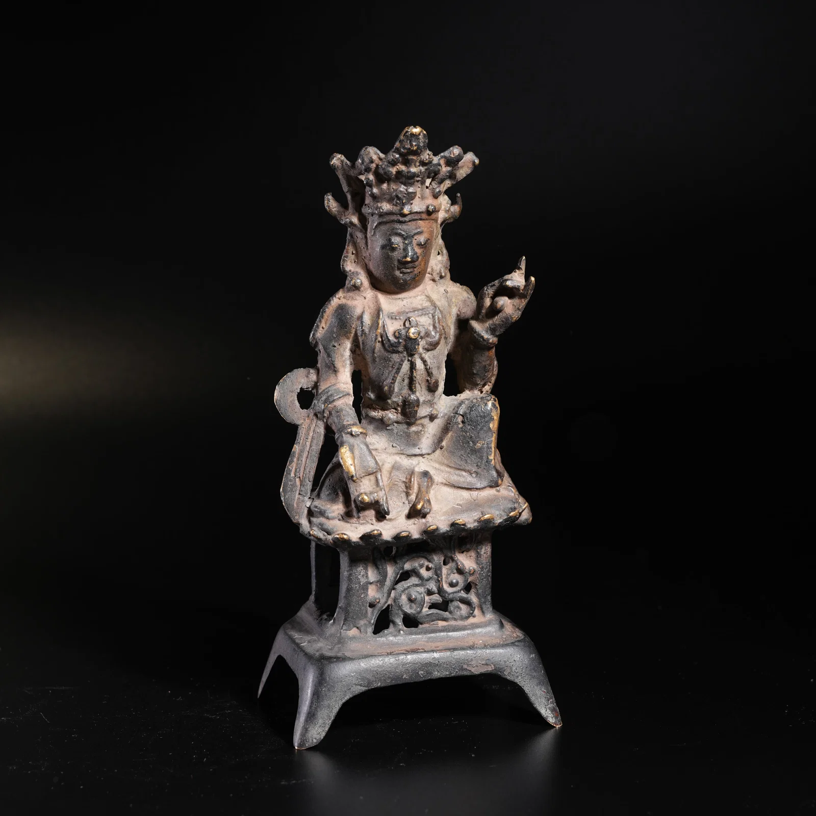 A BRONZE BUDDHA FIGURE