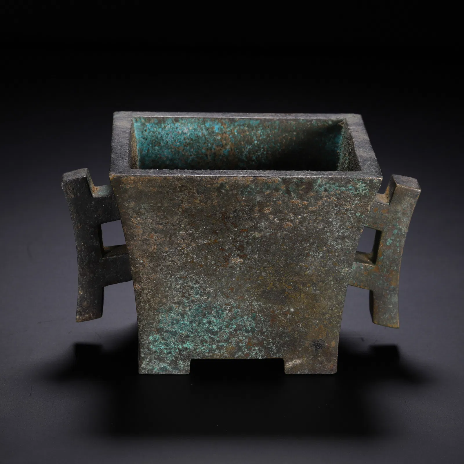 A BRONZE CENSER WITH COVER