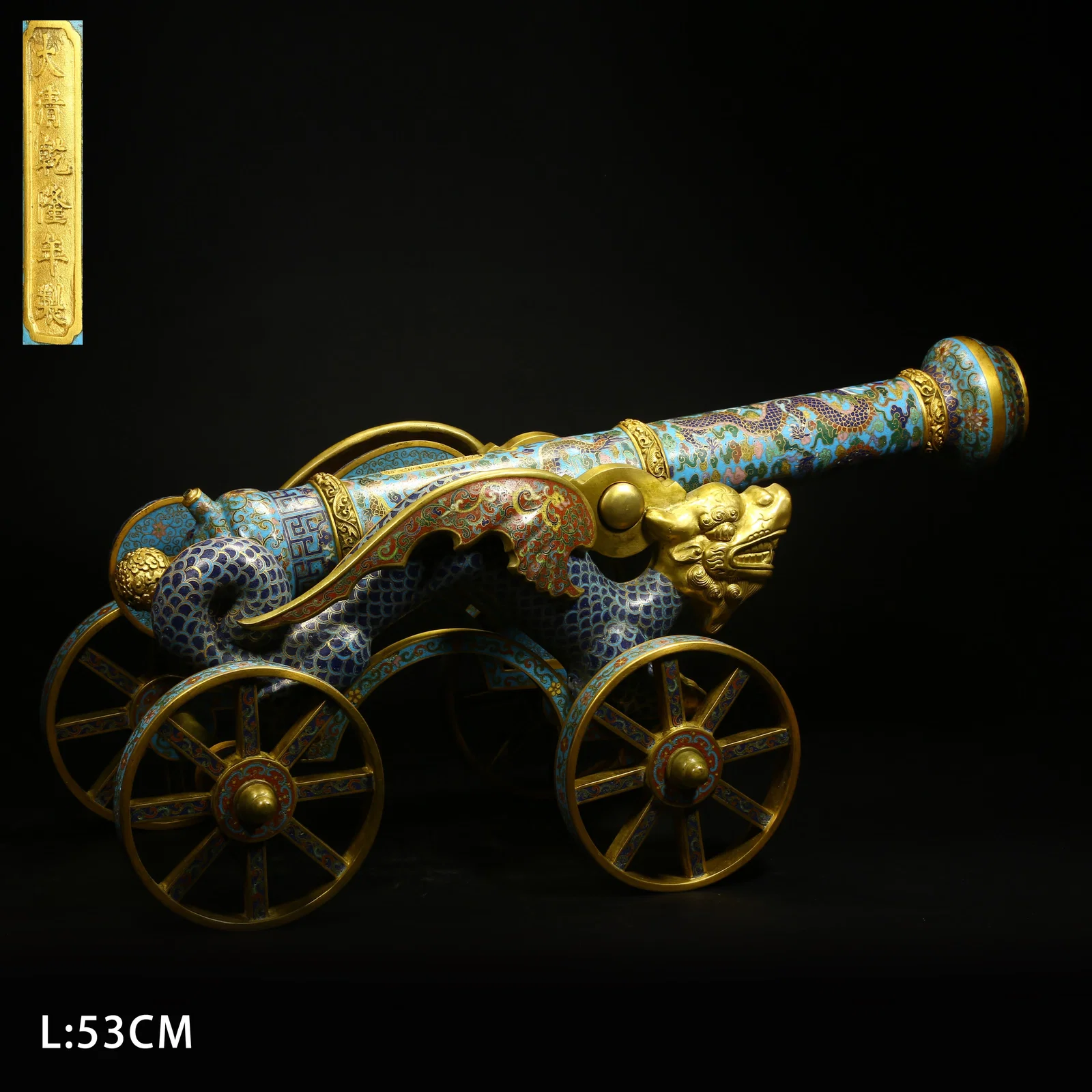 A BRONZE CLOISONNÉ ENAMEL CANNON