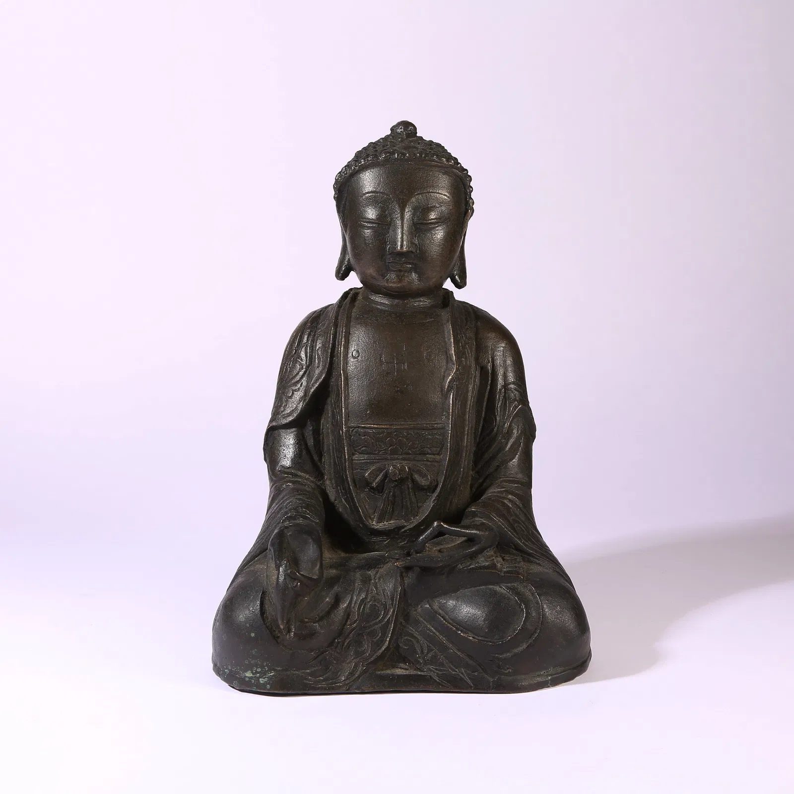 A BRONZE FIGURE OF BHAISAJYAGURU (MEDICINE BUDDHA)