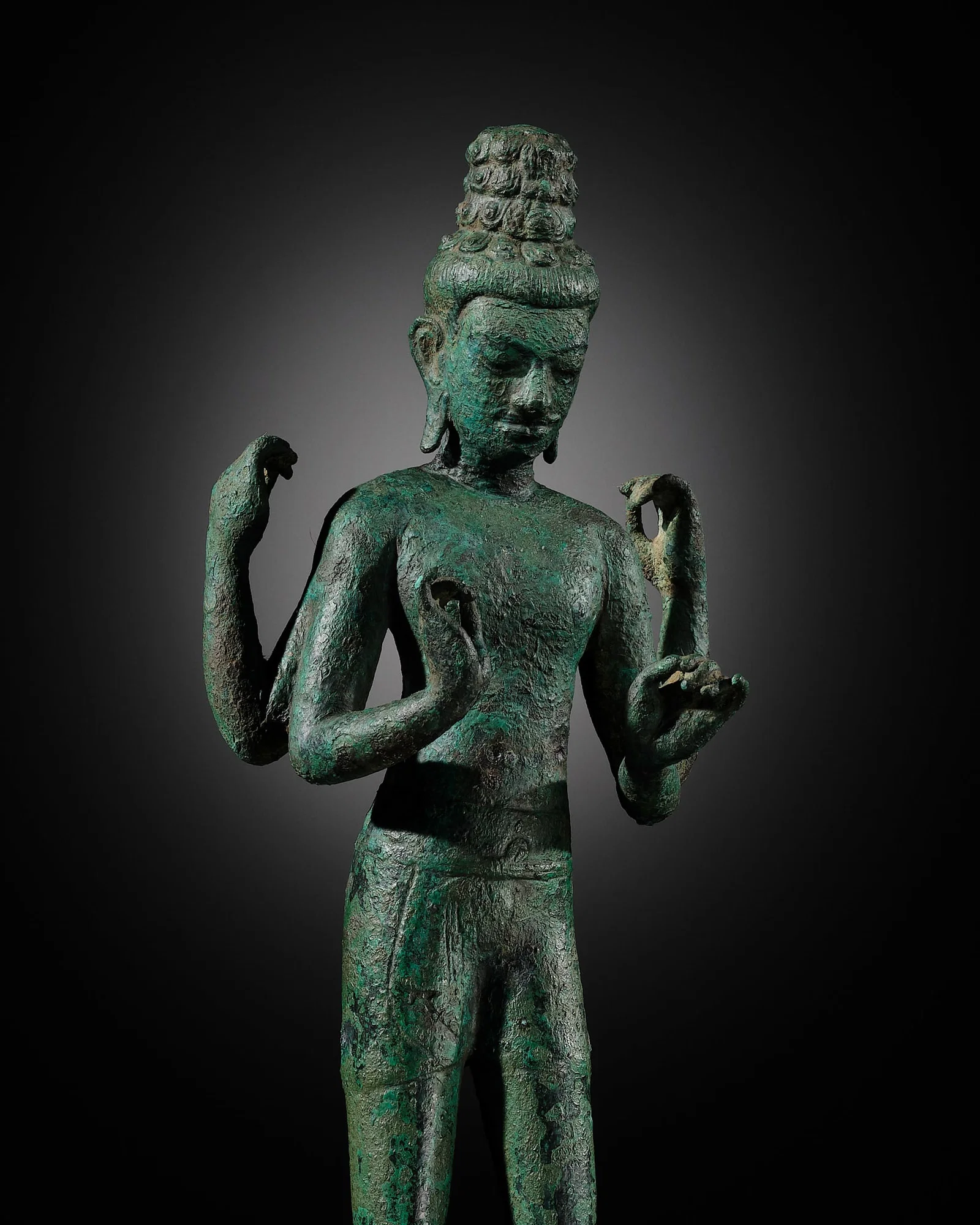 A BRONZE FIGURE OF MAITREYA, PRE-ANGKOR, EARLY 8TH CENTURY, PROBABLY FROM THE 'PRAKHON CHAI HOARD'