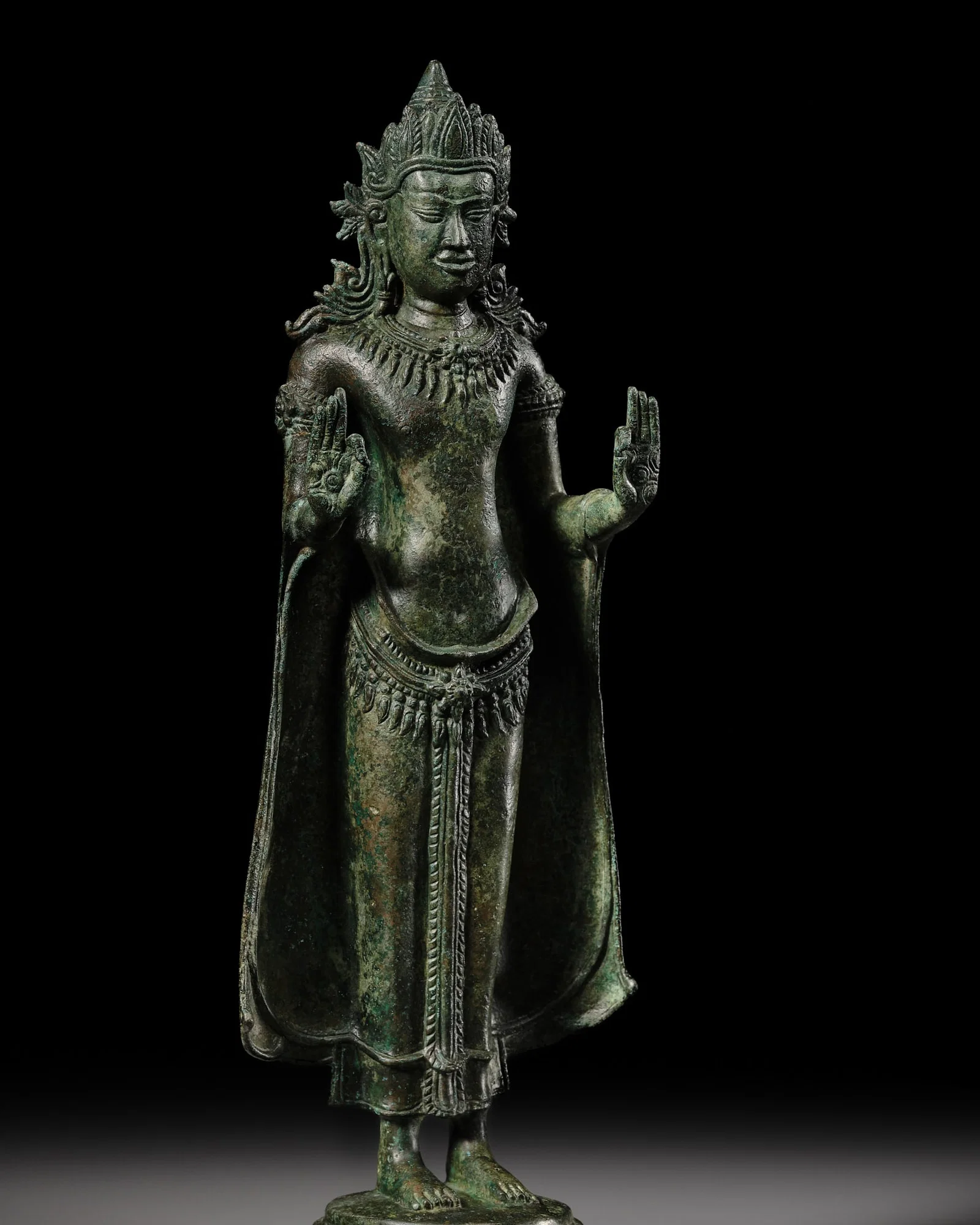 A BRONZE FIGURE OF THE CROWNED BUDDHA, THAILAND, LOPBURI, 12TH-13TH CENTURY