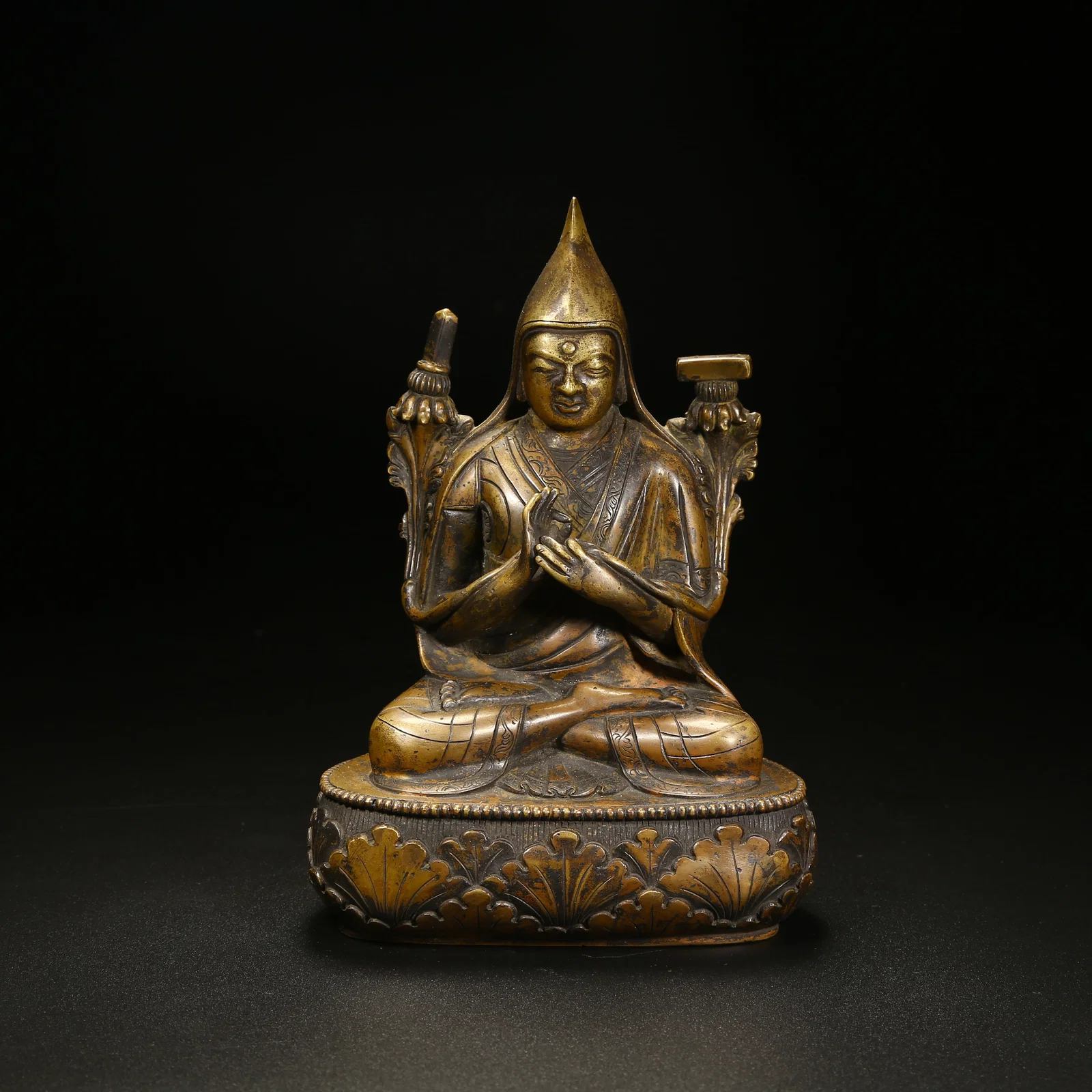 A BRONZE FIGURE OF TSONGKHAPA