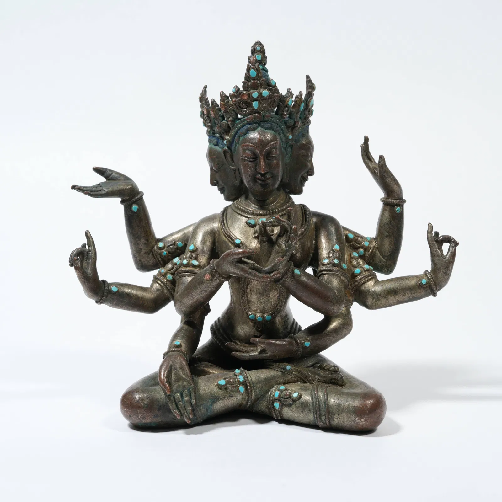 A BRONZE FIGURE OF U????AVIJAY? INLAID WITH TURQUOISE