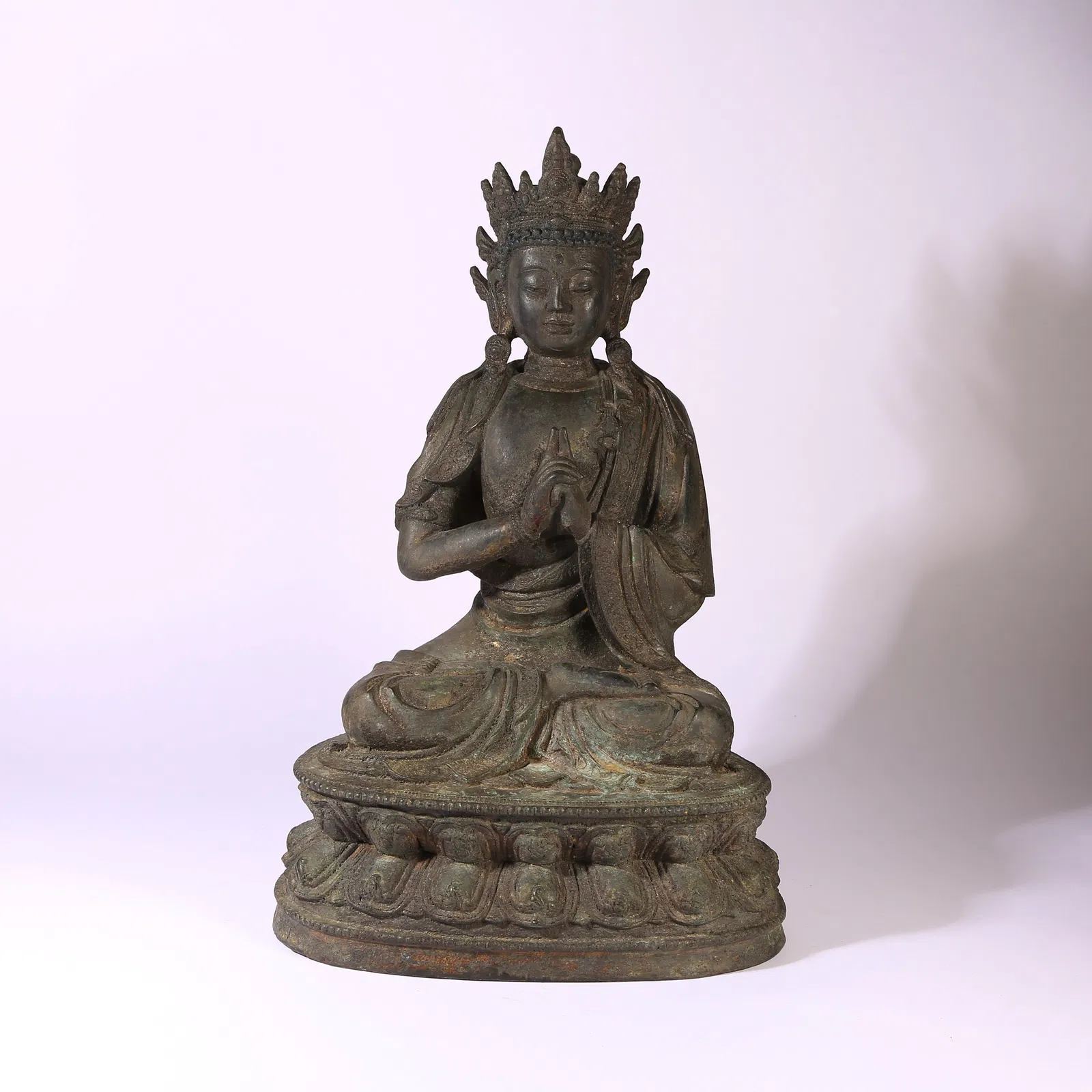 A BRONZE FIGURE OF VAIROCANA BUDDHA