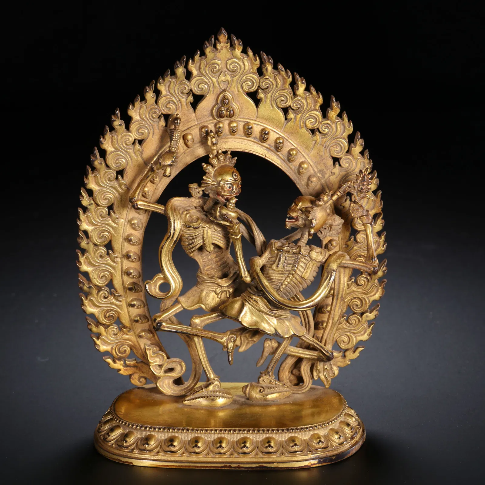 A BRONZE-GILT FIGURE OF CHITIPATI