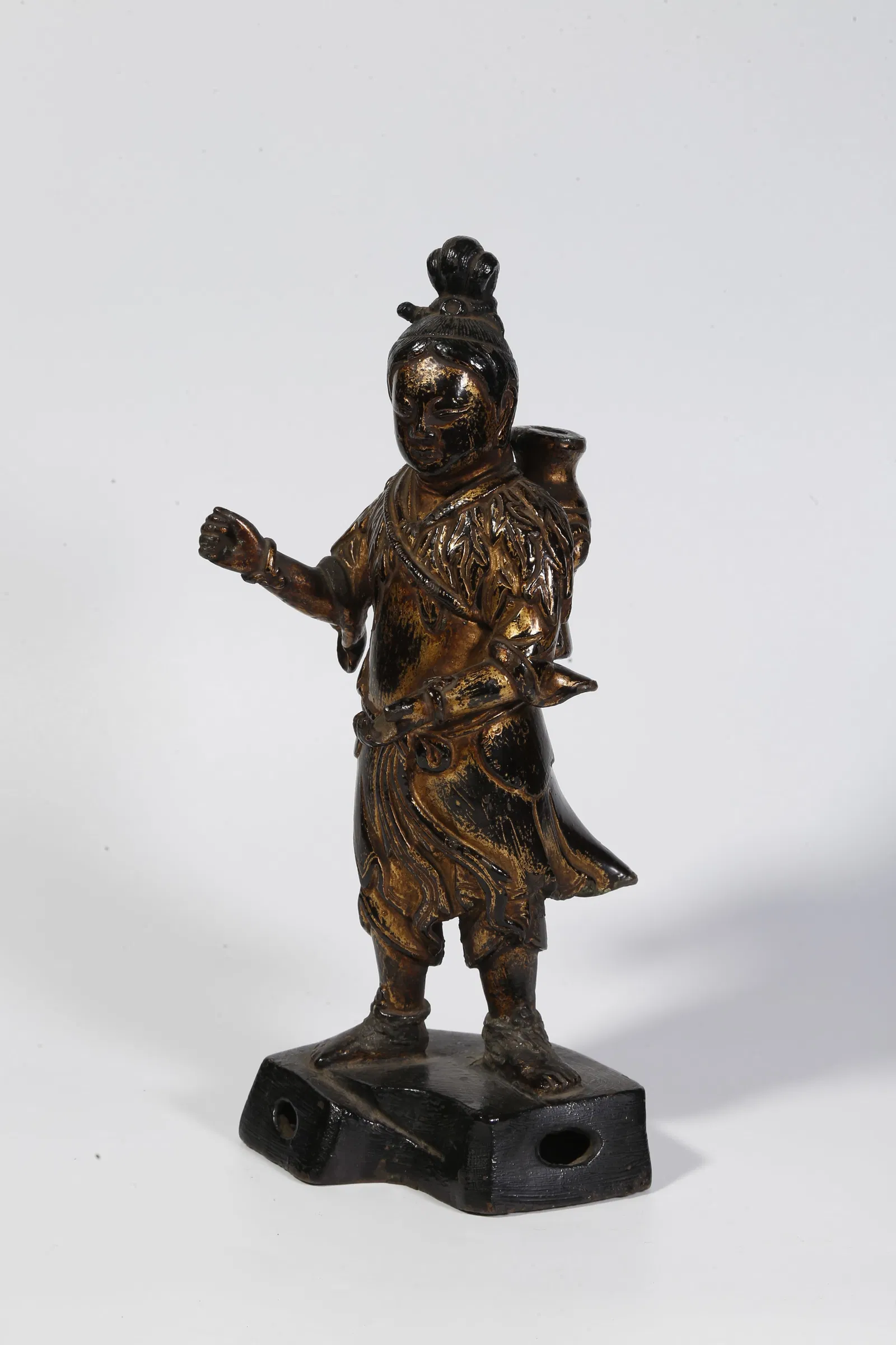A BRONZE GILT FIGURE ORNAMENT
