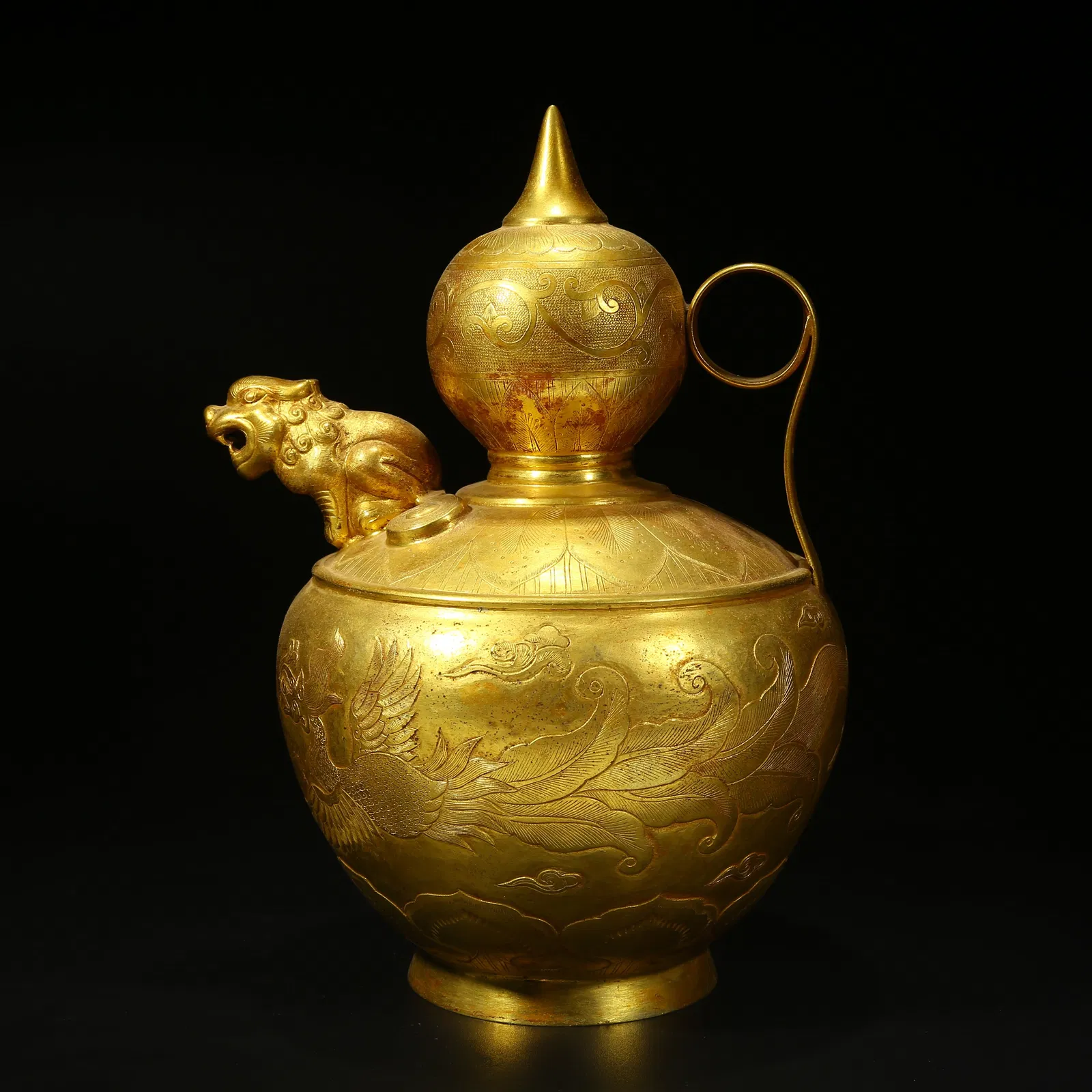 A BRONZE GILT PHOENIX-PATTERNED INCENSE BURNER