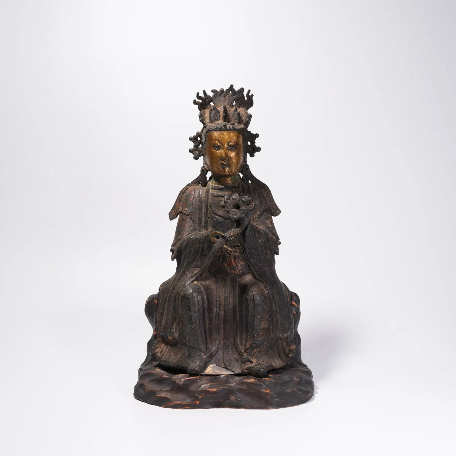 A BRONZE GUANYIN STATUE