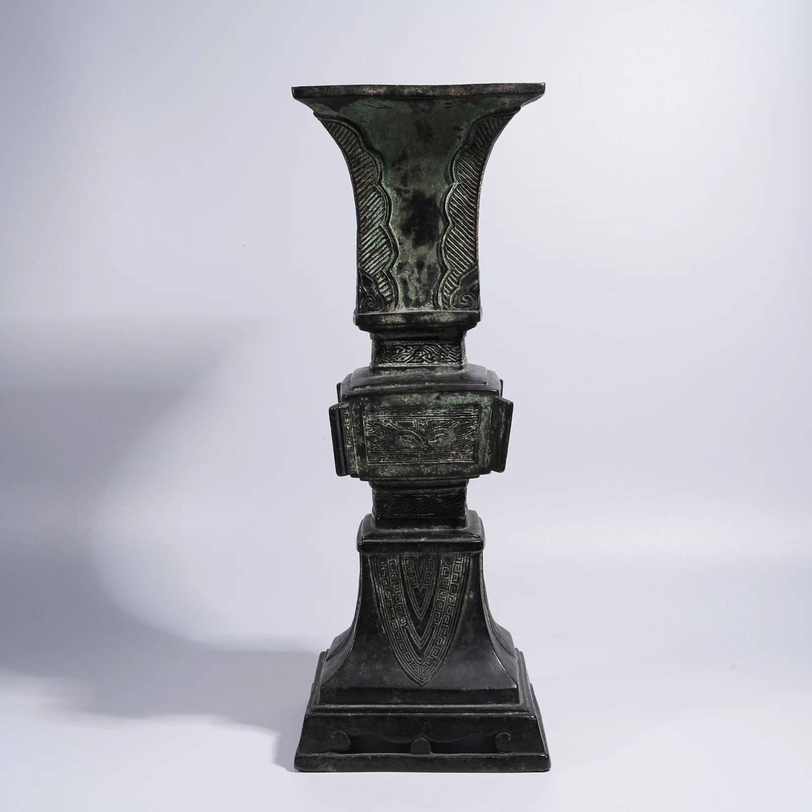A BRONZE HU VASE WITH EVERTED MOUTH