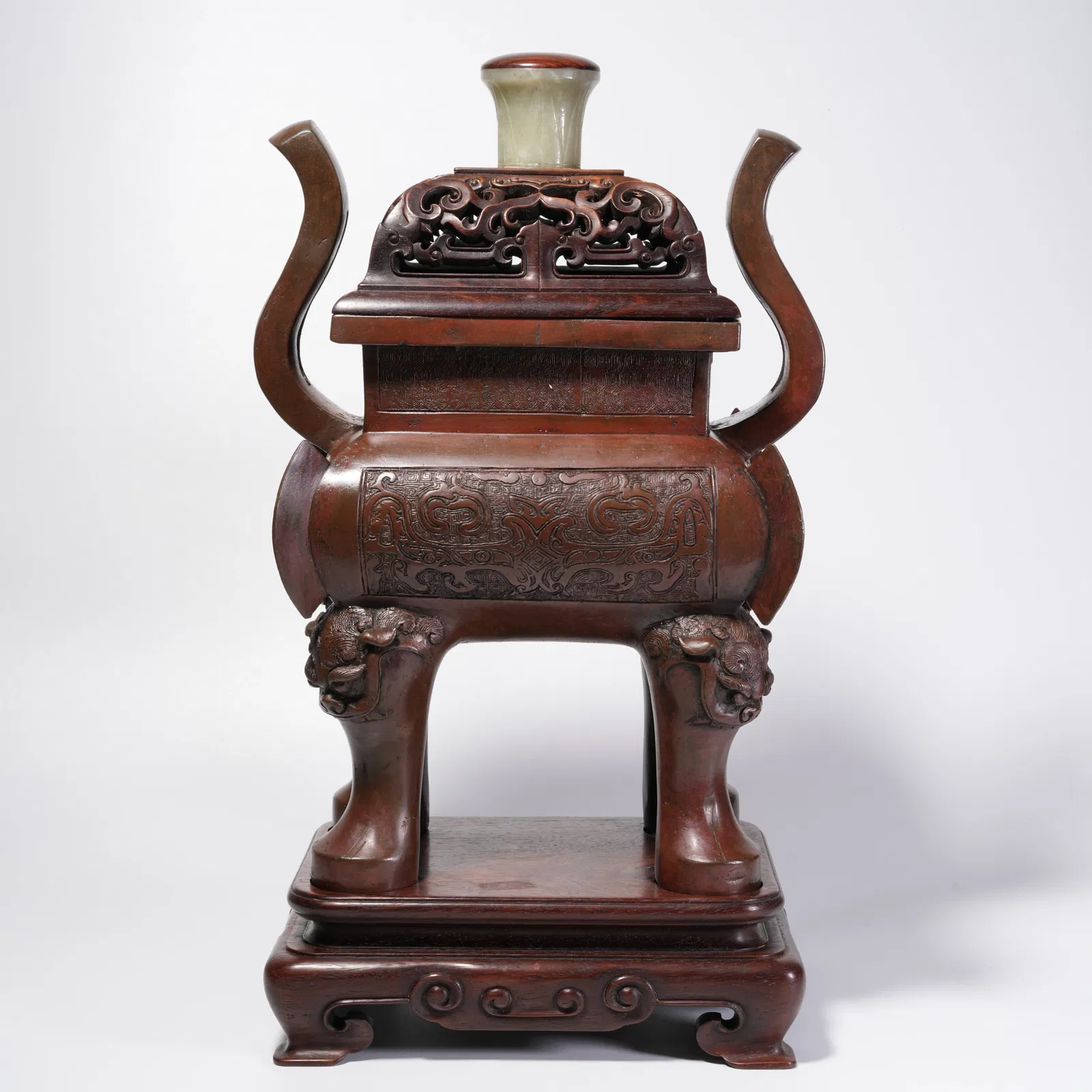 A BRONZE INCENSE BURNER WITH BEAST-FACE PATTERN