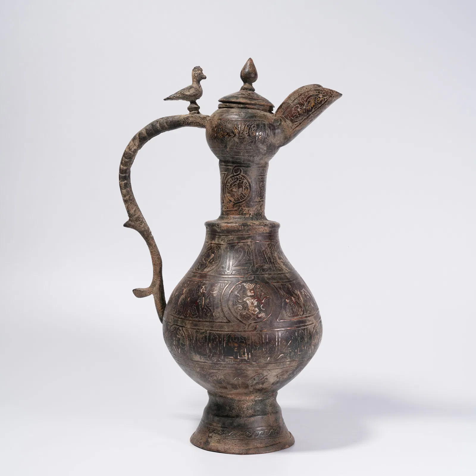 A BRONZE INLAID SILVER EWER