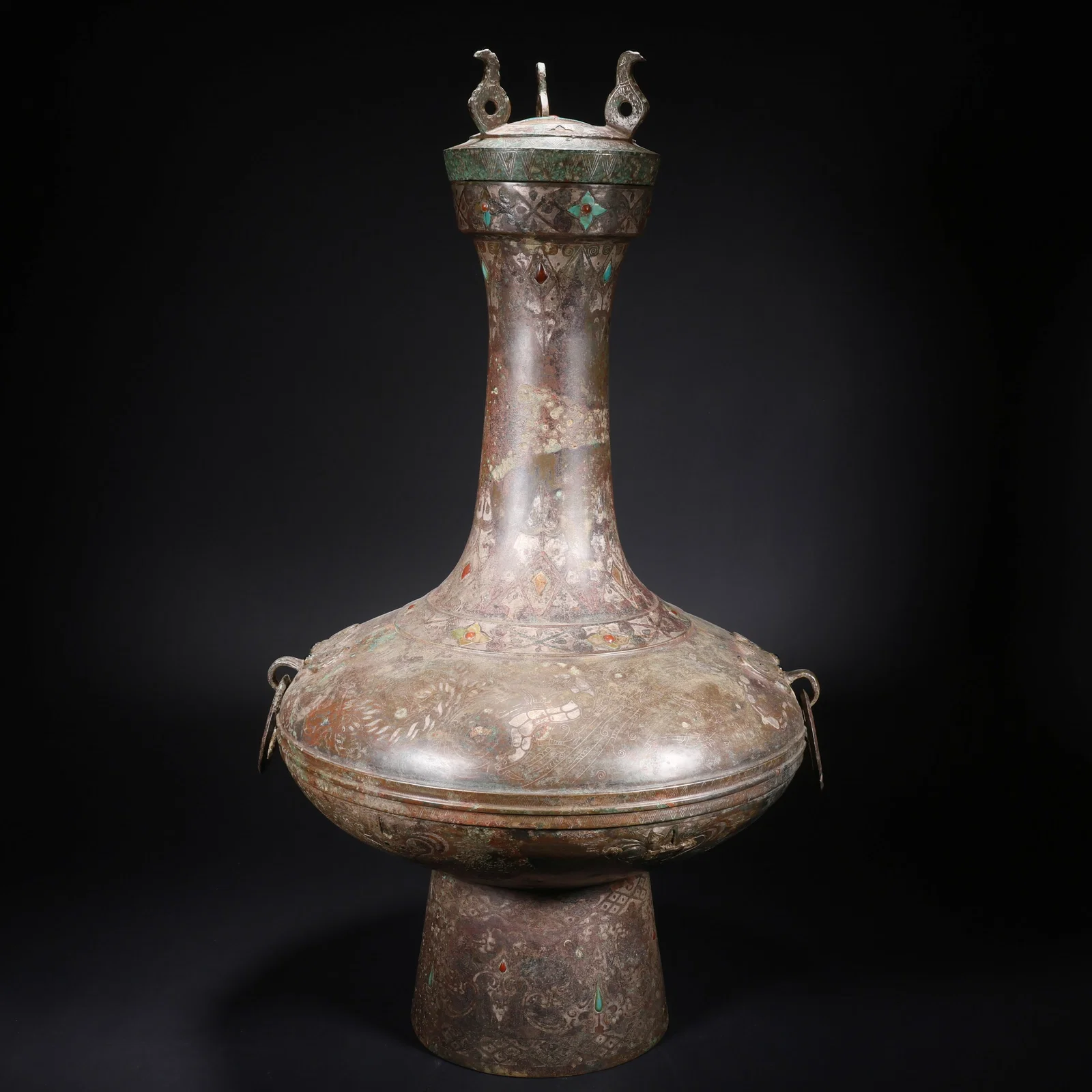 A BRONZE LONG-NECKED DOUBLE-HANDLED VASE INLAID WITH SILVER AND PRECIOUS STONES
