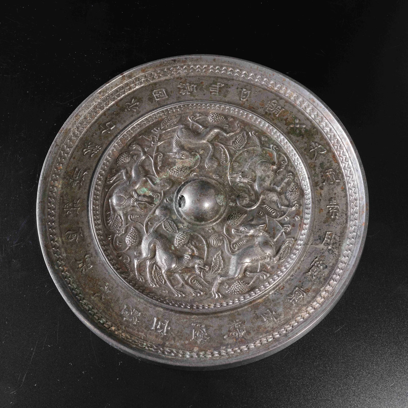 A BRONZE MIRROR