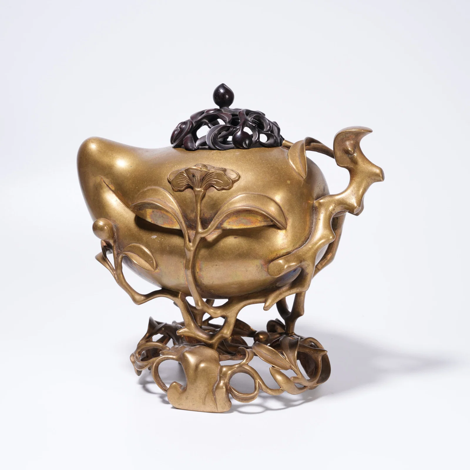 A BRONZE PEACH-SHAPED CENSER
