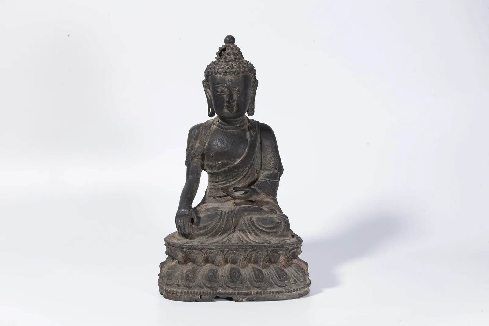 A BRONZE SHAKYAMUNI FIGURE