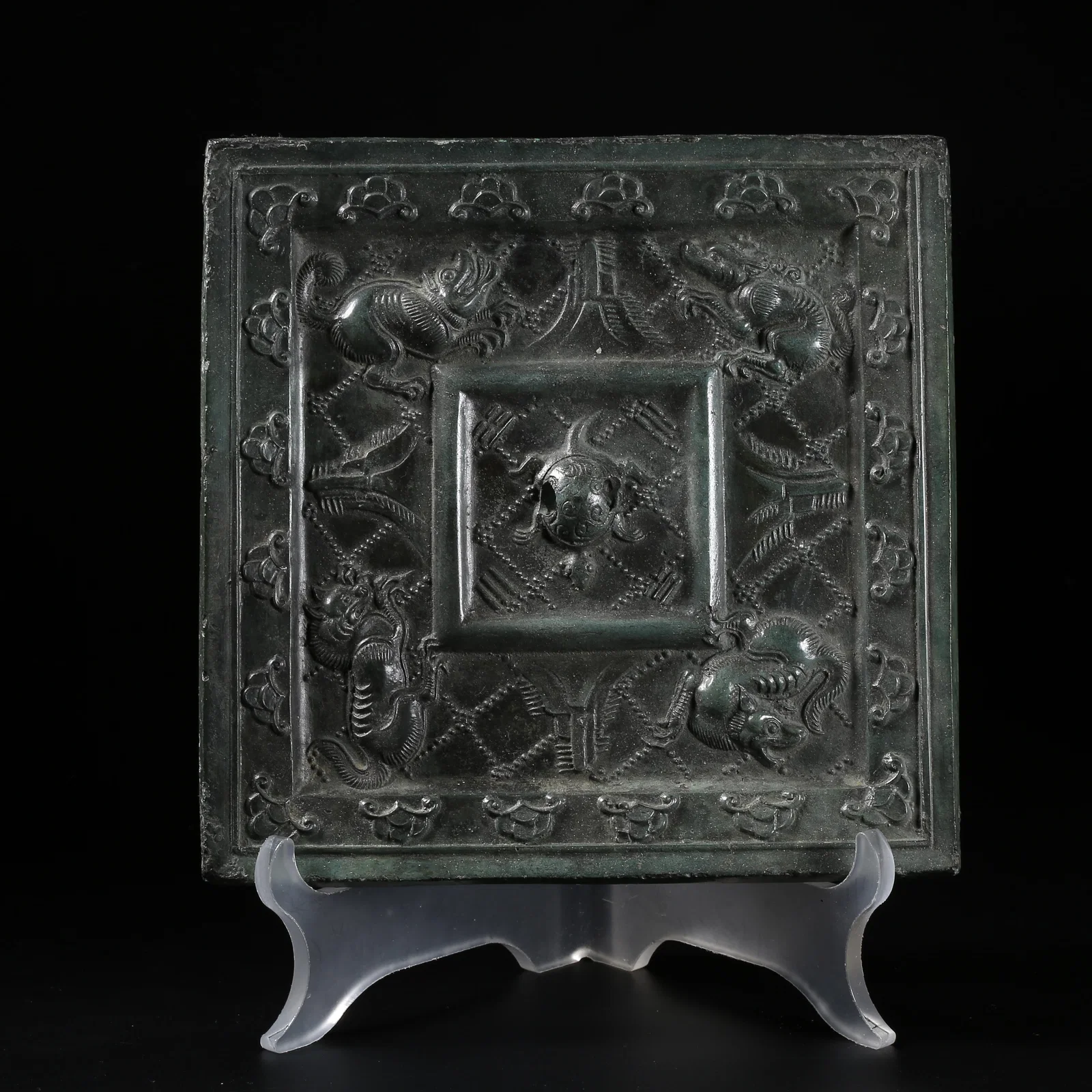A BRONZE SQUARE MIRROR WITH BEAST-FACE PATTERN