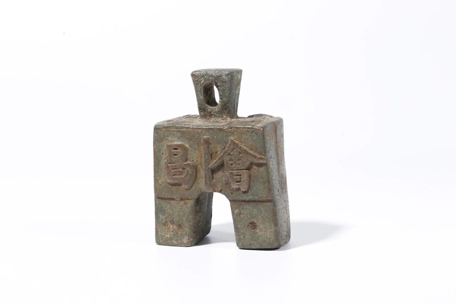 A BRONZE STEELYARD WEIGHT