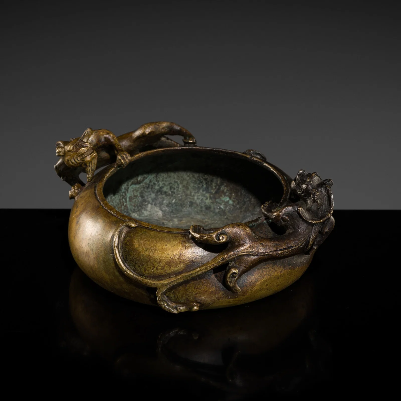 A BRONZE 'TWIN CHILONG' WATER POT, QING DYNASTY