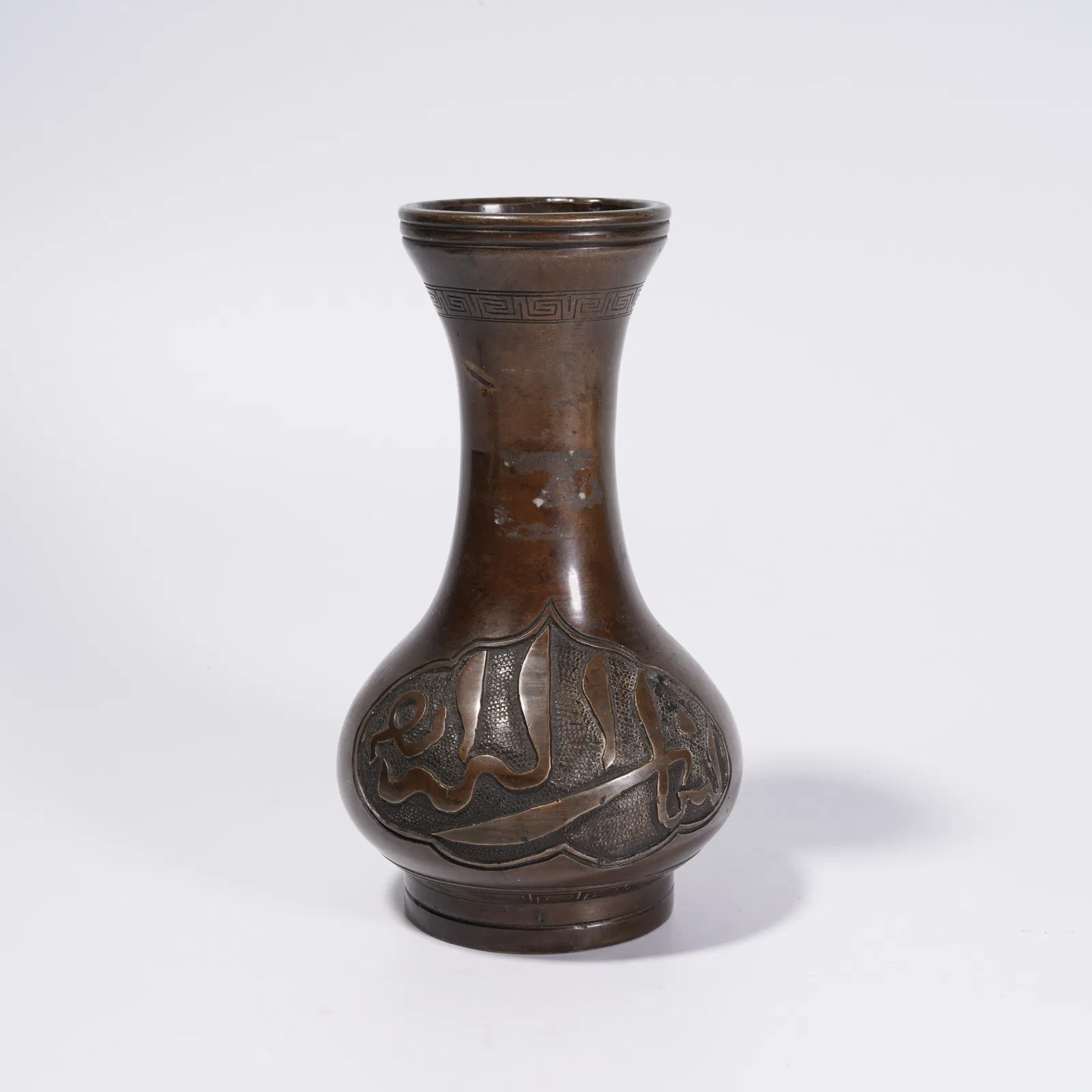 A BRONZE VASE