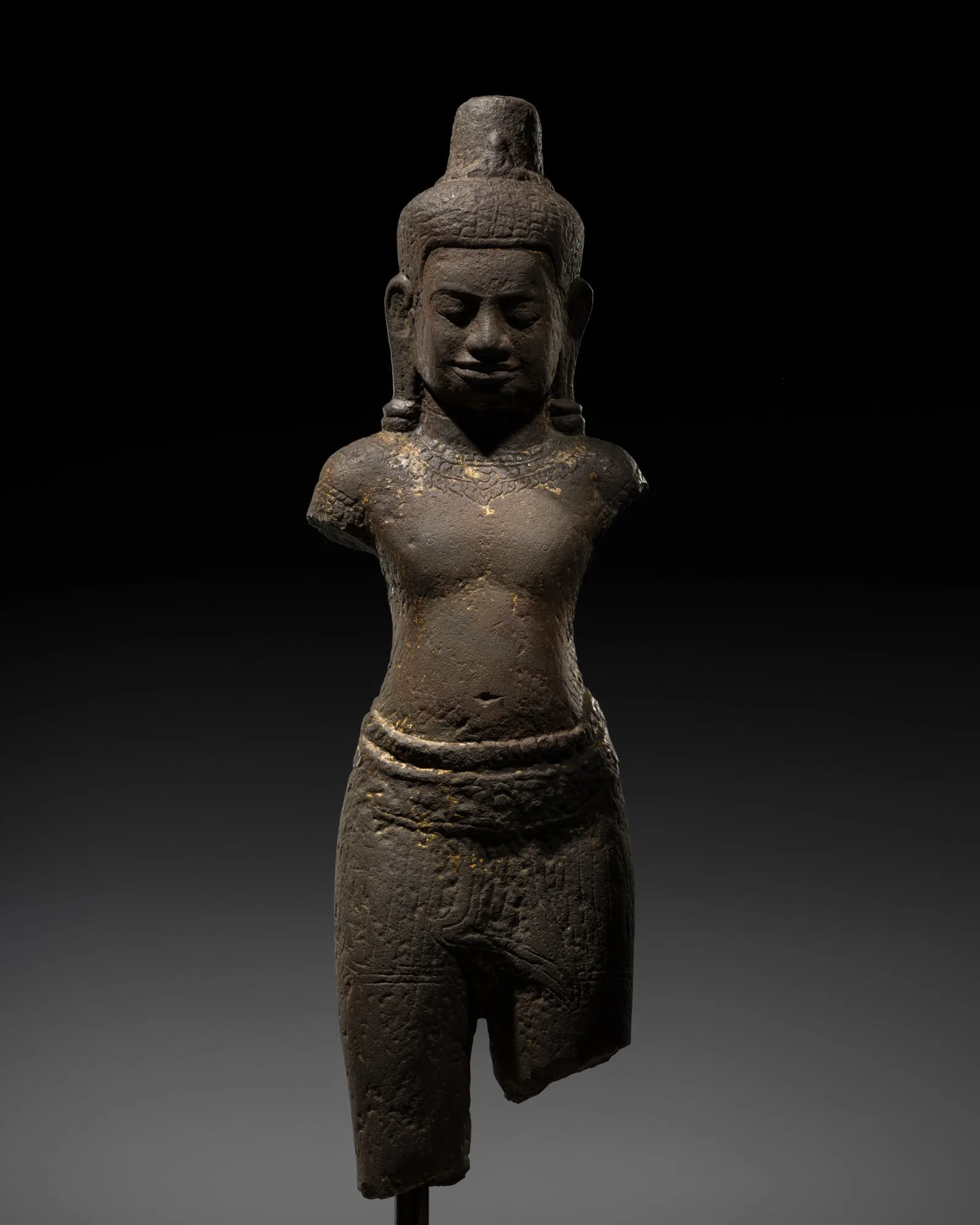 A BUFF SANDSTONE FIGURE OF LOKESHVARA, ANGKOR PERIOD, BAYON STYLE, 12TH-13TH CENTURY