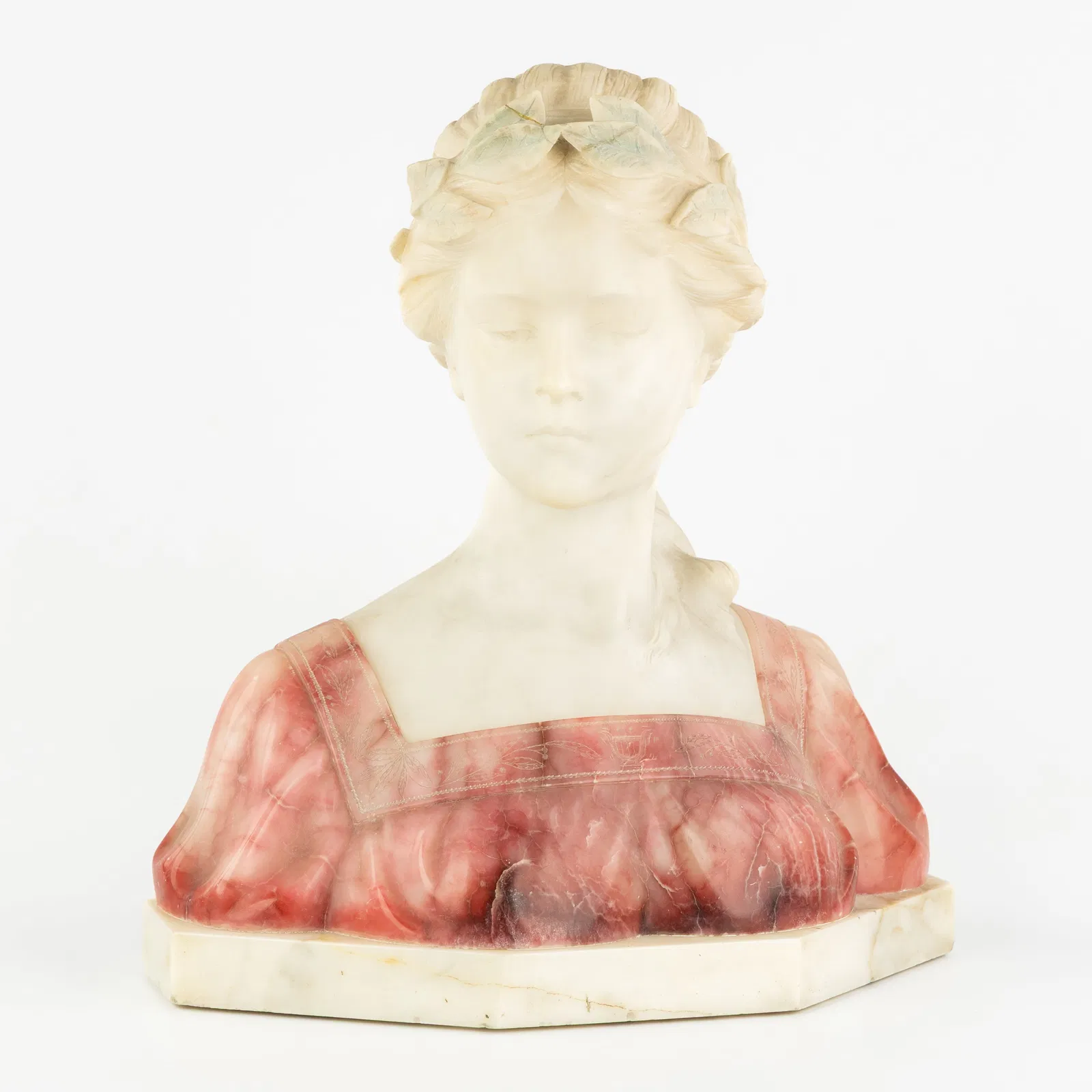 A Bust of a Young Lady, multicoloured alabaster, signed Nelson.