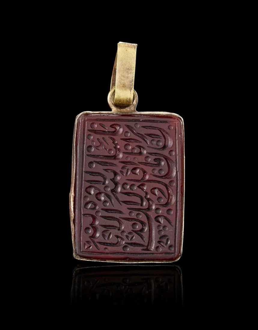 A CALLIGRAPHIC INSCRIBED AGATE AMULET, 18TH CENTURY, PERSIA