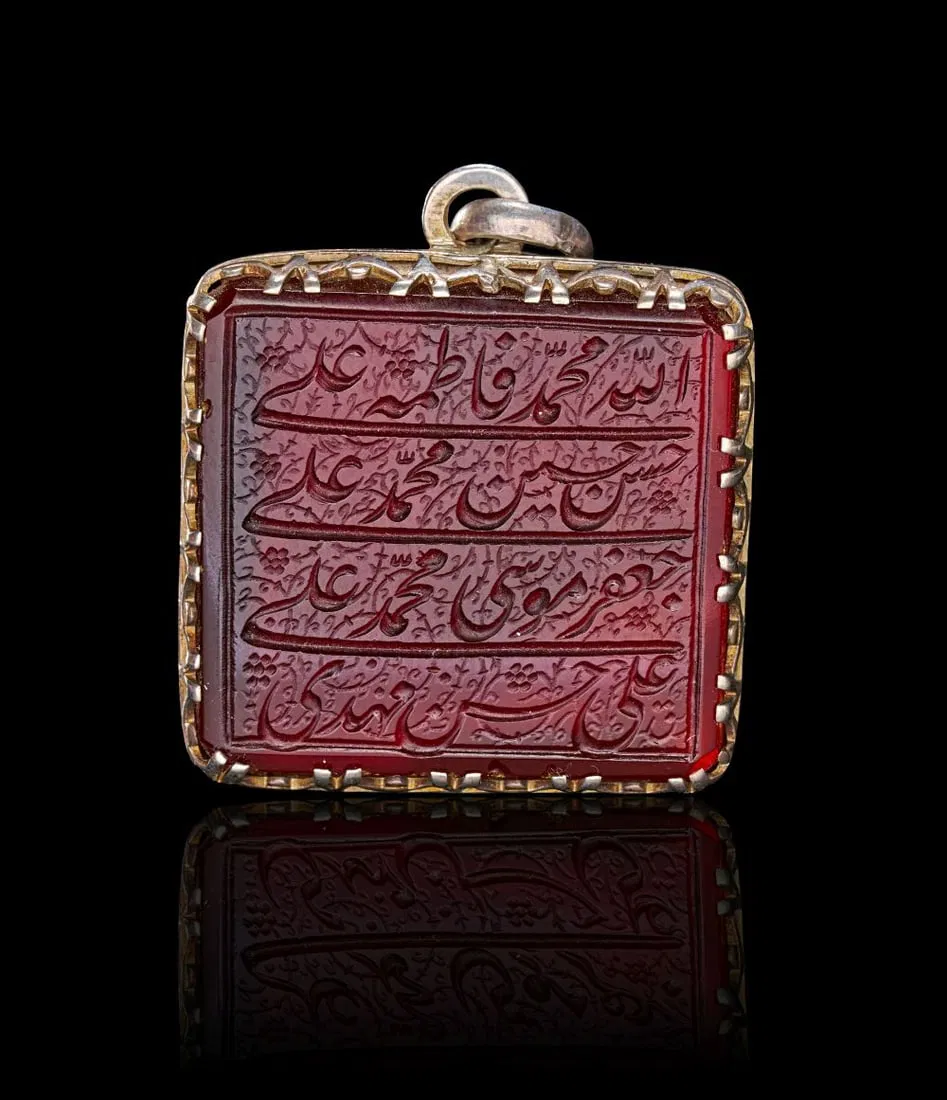 A CALLIGRAPHIC INSCRIBED AGATE AMULET, 19TH CENTURY, PERSIA