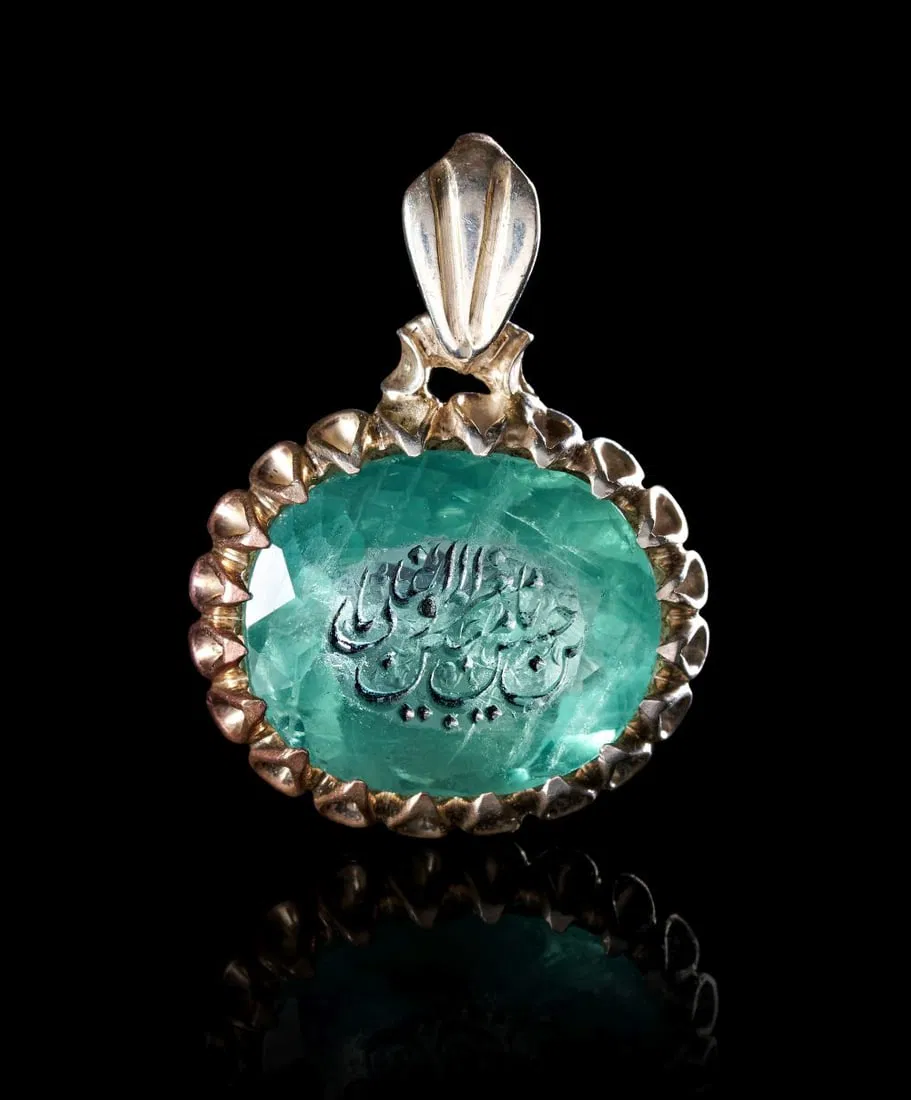A CALLIGRAPHIC INSCRIBED EMERALD AMULET, 19TH CENTURY, PERSIA