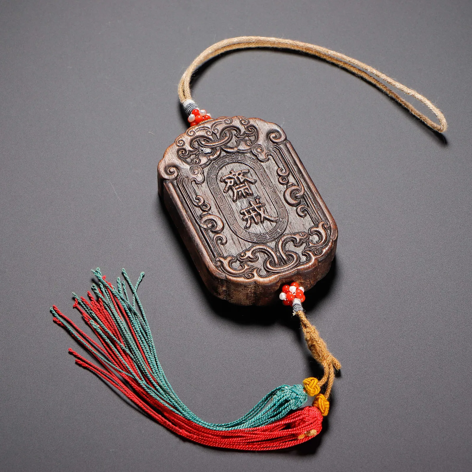 A CARVED ALOESWOOD CHENXIANG ABSTINENCE PLAQUE