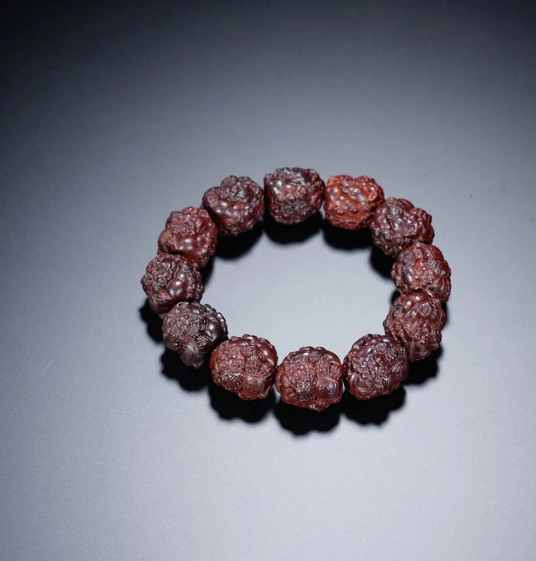 A CARVED BEADS PRAYER BEADS