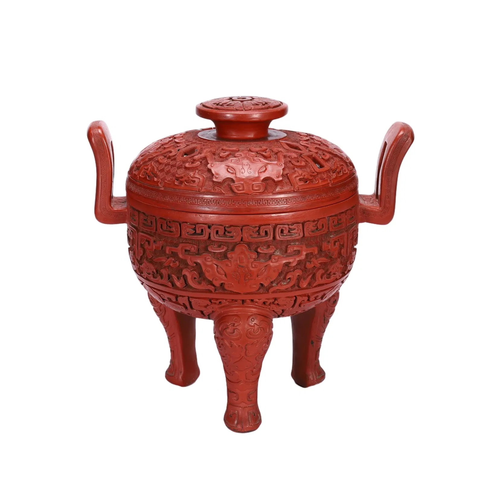 A CARVED CINNABAR LACQUER TRIPOD CENSER WITH COVER