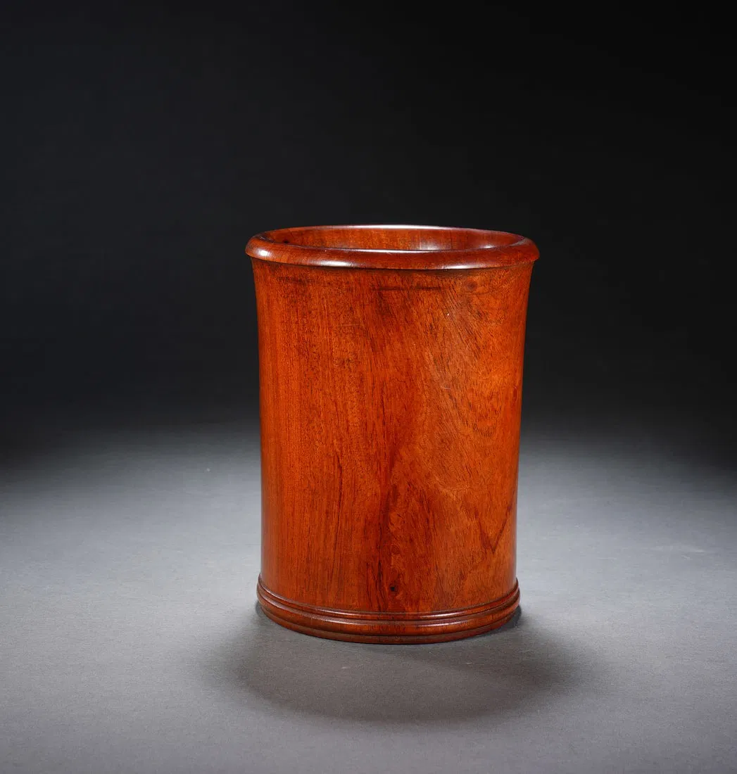 A CARVED HUANGHUALI BRUSHPOT