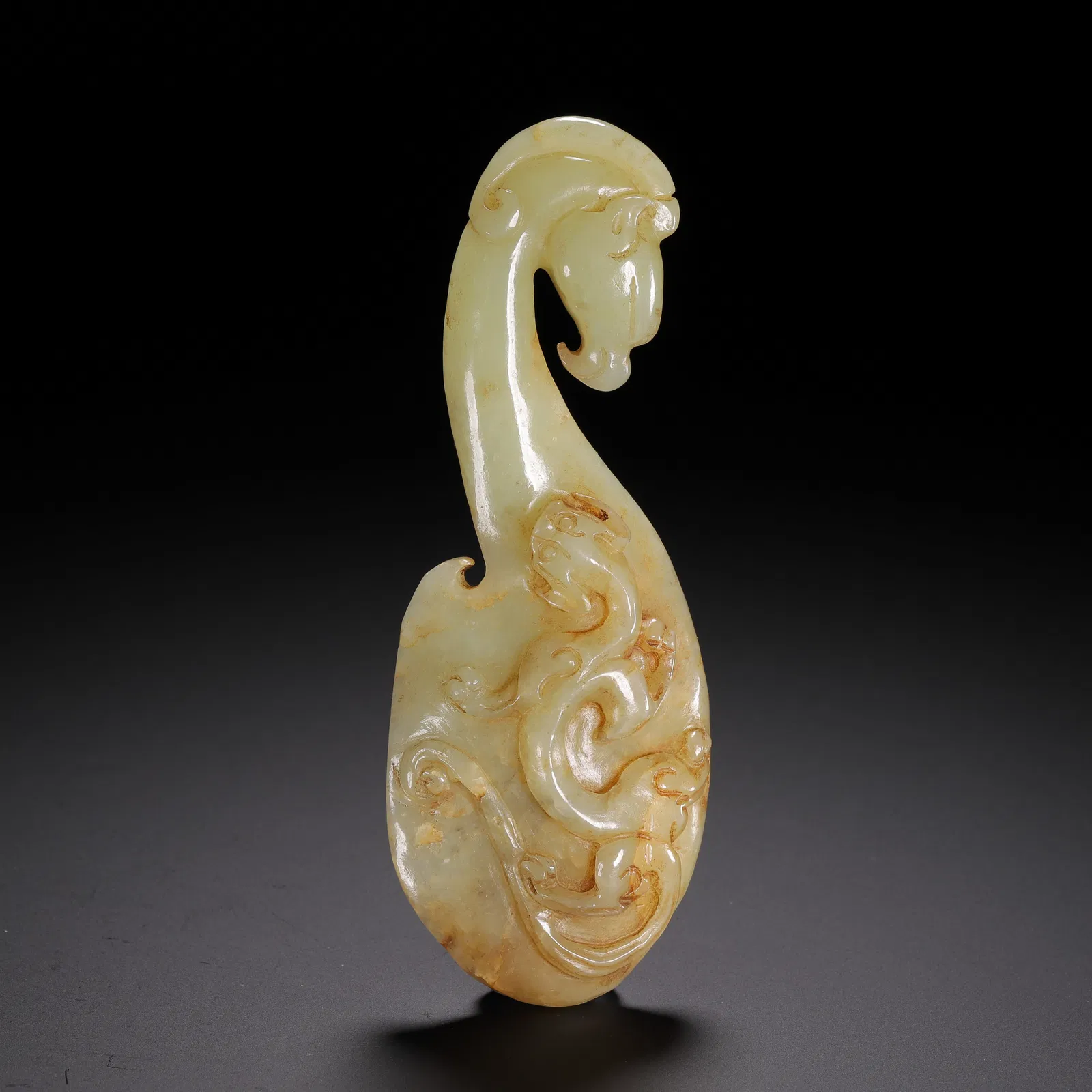 A CARVED JADE CHILONG BELTHOOK