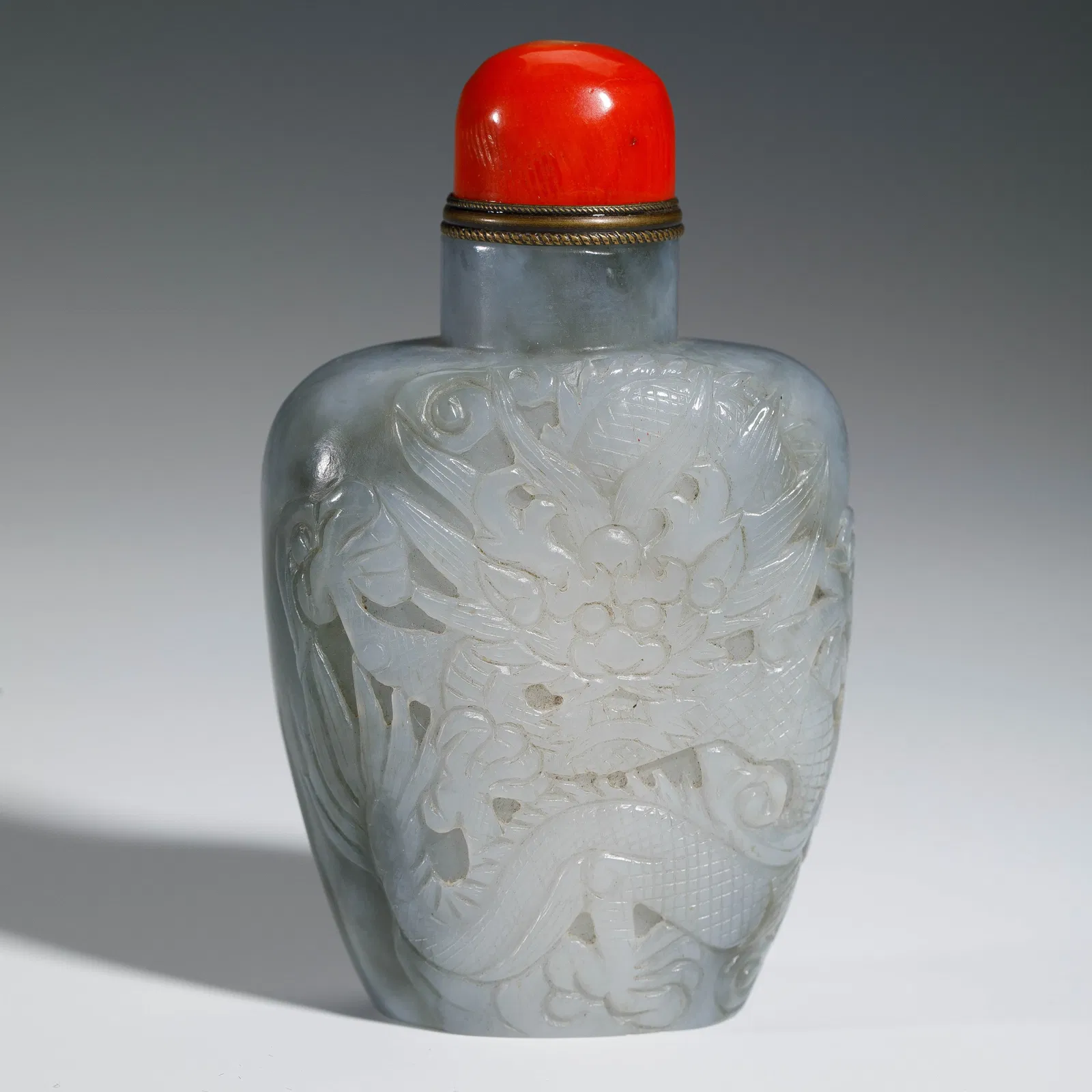 A CARVED JADE DRAGON SNUFF BOTTLE