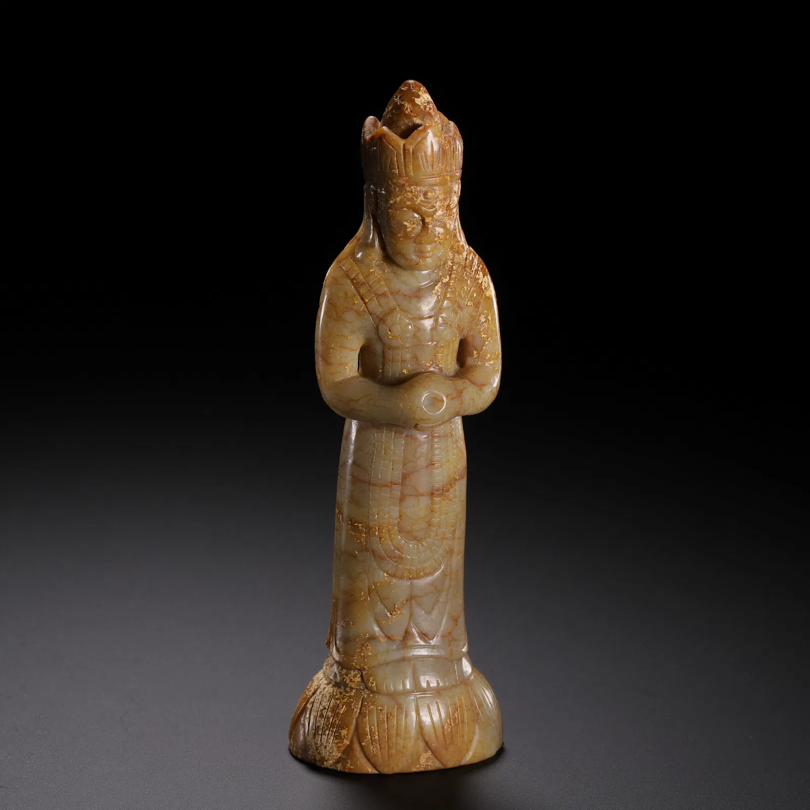 A CARVED JADE STANDING BODHISATTVA