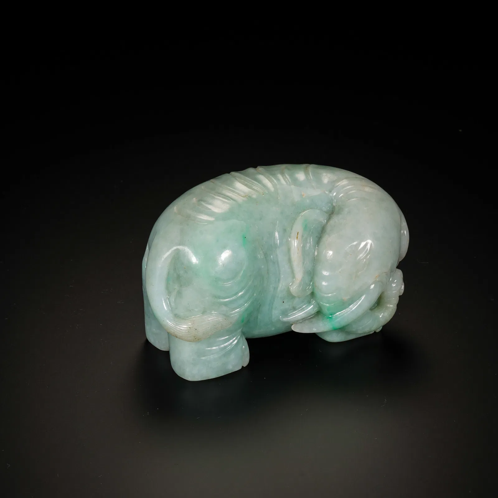 A CARVED JADEITE ELEPHANT