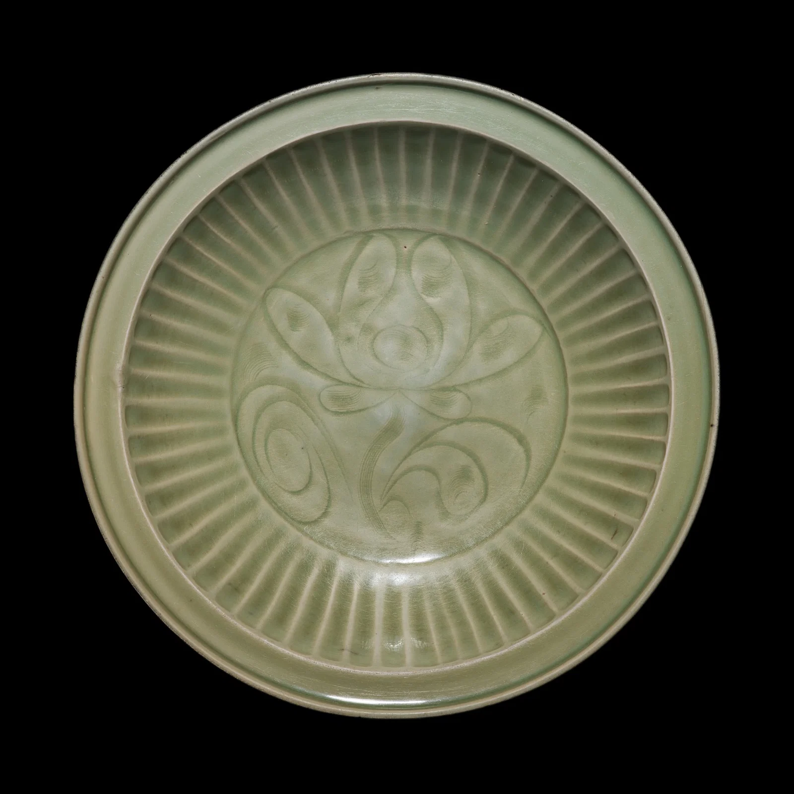 A CARVED 'LOTUS' LONGQUAN CELADON DISH, YUAN DYNASTY