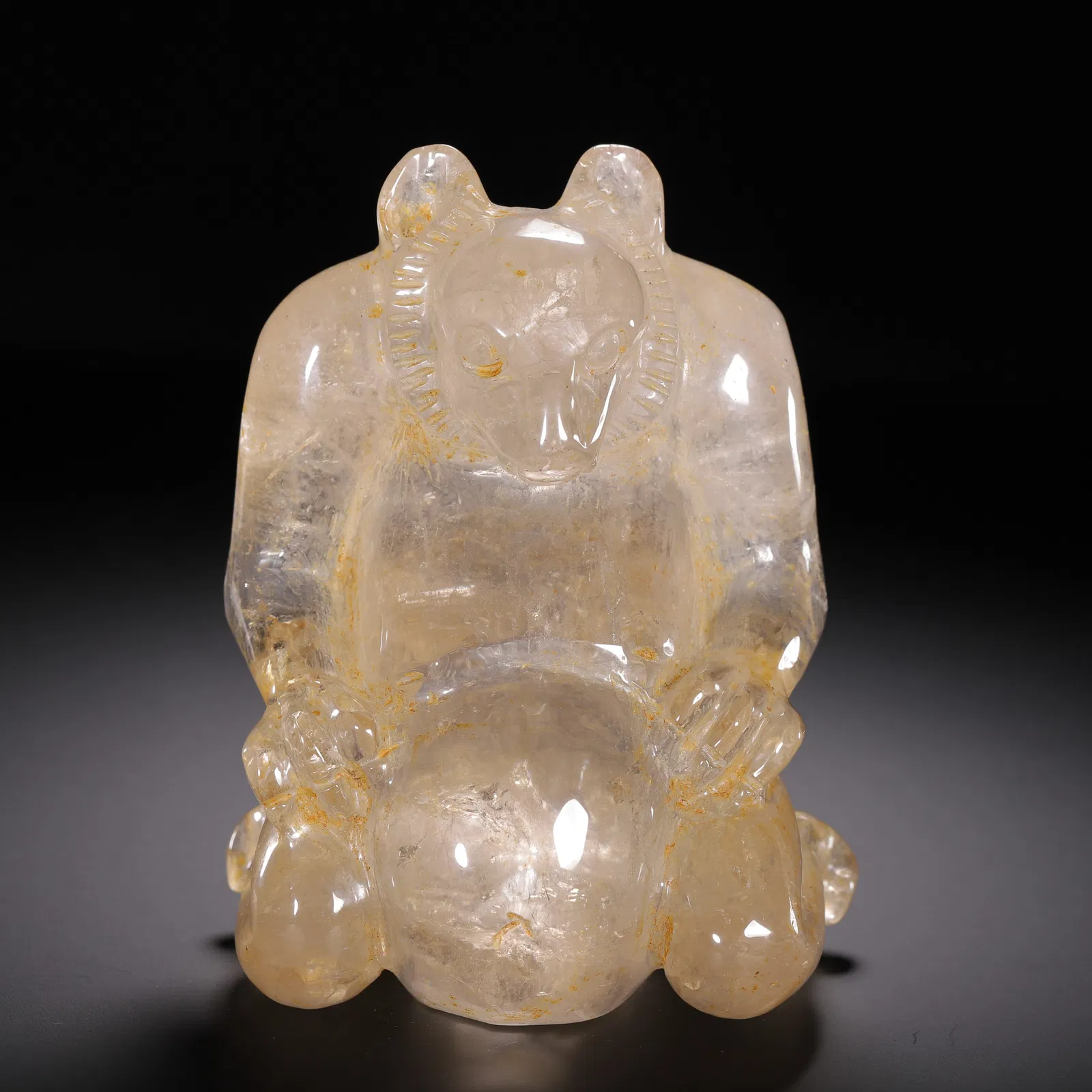 A CARVED ROCK CRYSTAL BEAR