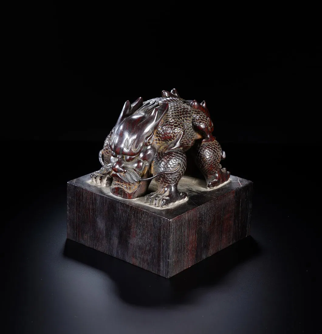 A CARVED ROSEWOOD ZITAN DRAGON SEAL