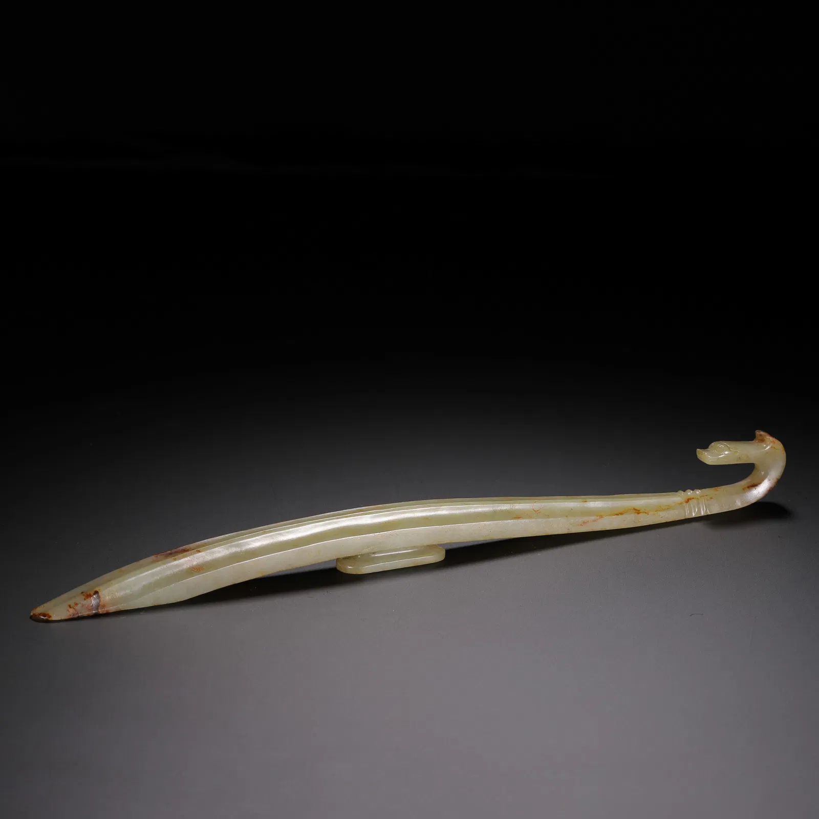 A CARVED WHITE JADE BELTHOOK