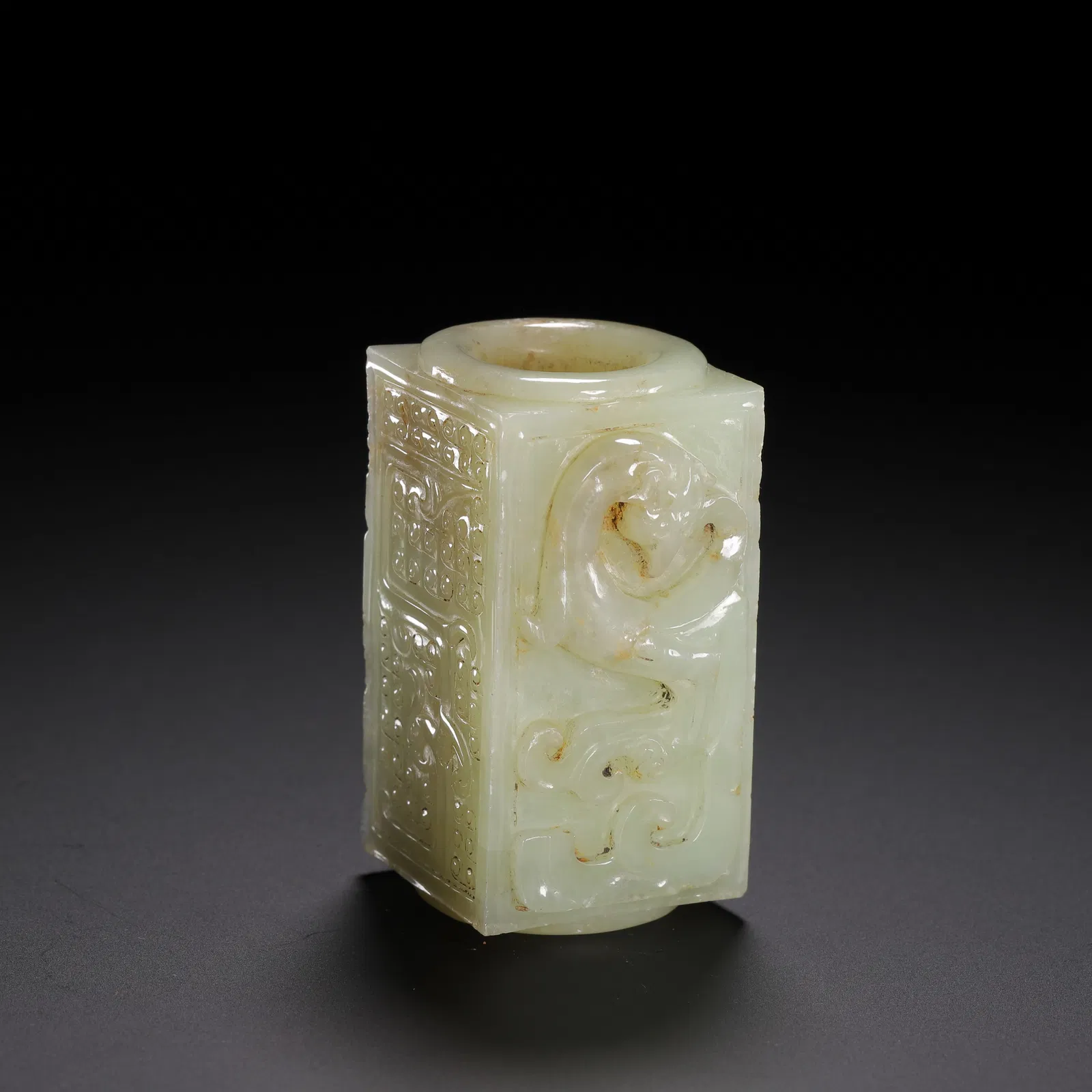 A CARVED WHITE JADE CONG