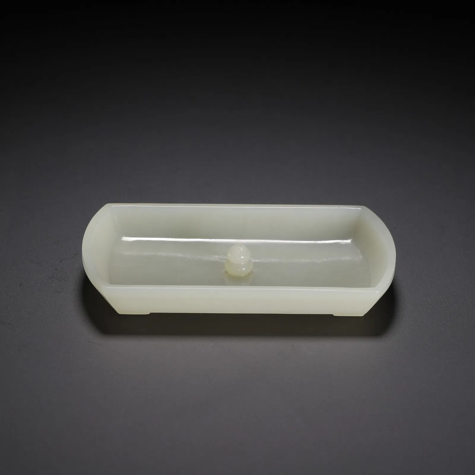 A CARVED WHITE JADE INCENSE HOLDER