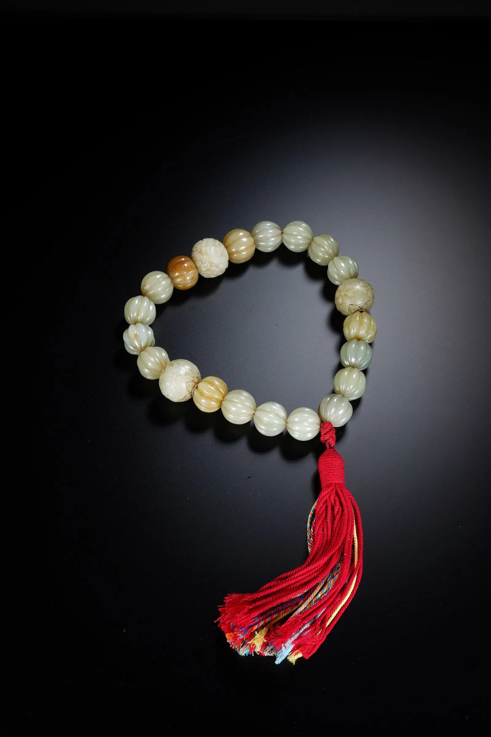 A CARVED WHITE JADE PRAYER BEADS SHOUCHUAN