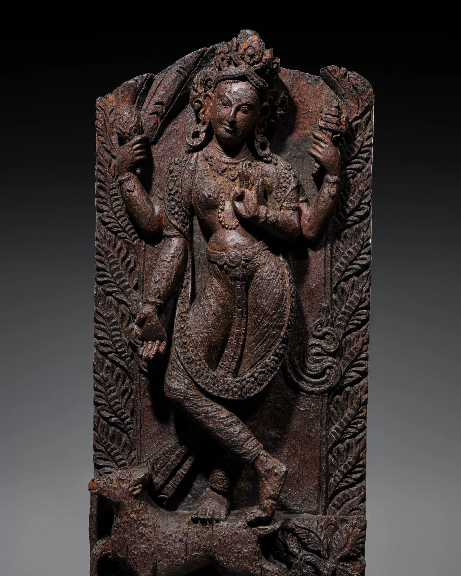 A CARVED WOOD TEMPLE STRUT DEPICTING MAHESHVARI, NEPAL, 17TH-18TH CENTURY