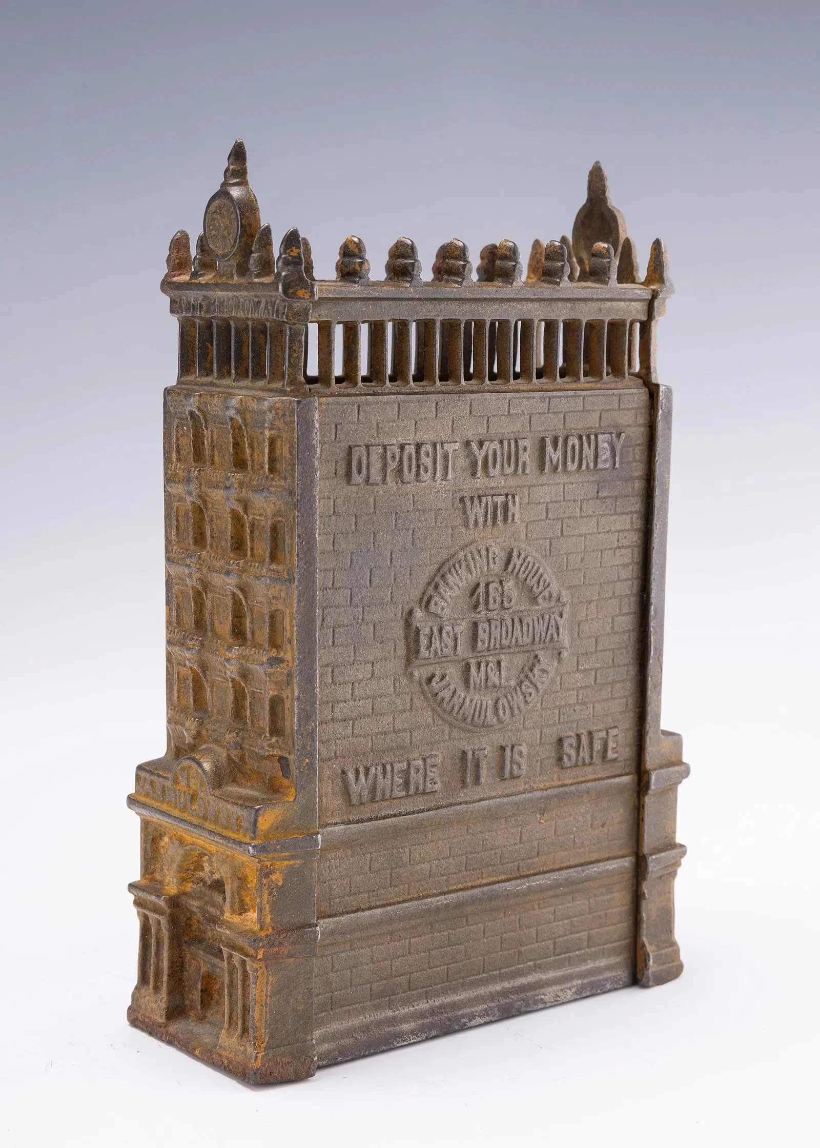 A CAST IRON SAVINGS BANK OF THE JARMULOWSKY BUILDING. New York, early 20th century.