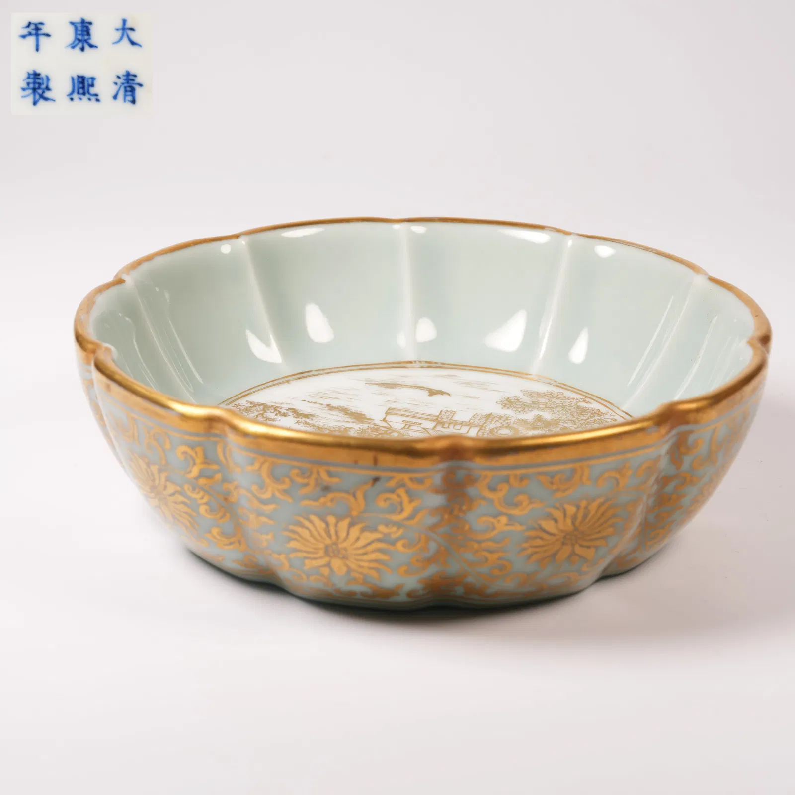 A CELADON-AND-GILT BRUSH WASHER WITH LANDSCAPE MOTIF AND FLARED RIM